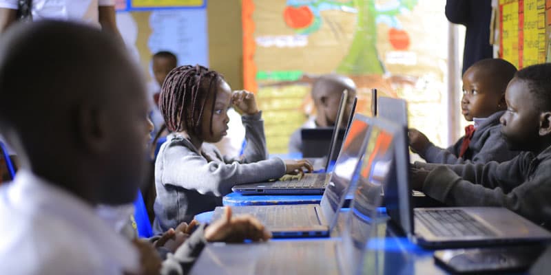 Child engaged in a computer lesson