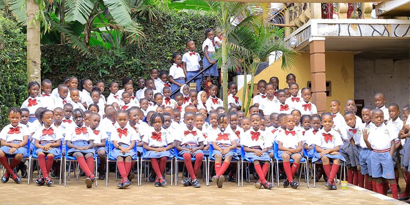 Happy children gathered in the school yard