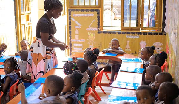 Children engaged in a classroom lesson