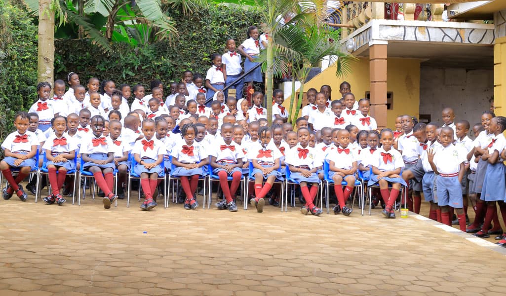 Happy students smiling together at school