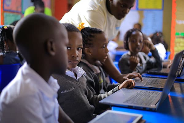 Students in the computer lab during a computer lesson