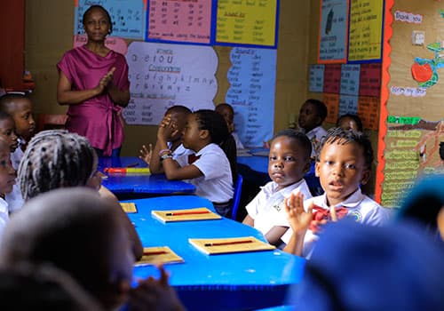 Children engaged in a classroom lesson
