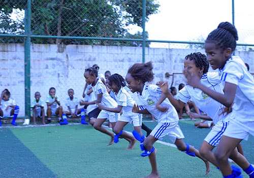 Children running during sports day activities